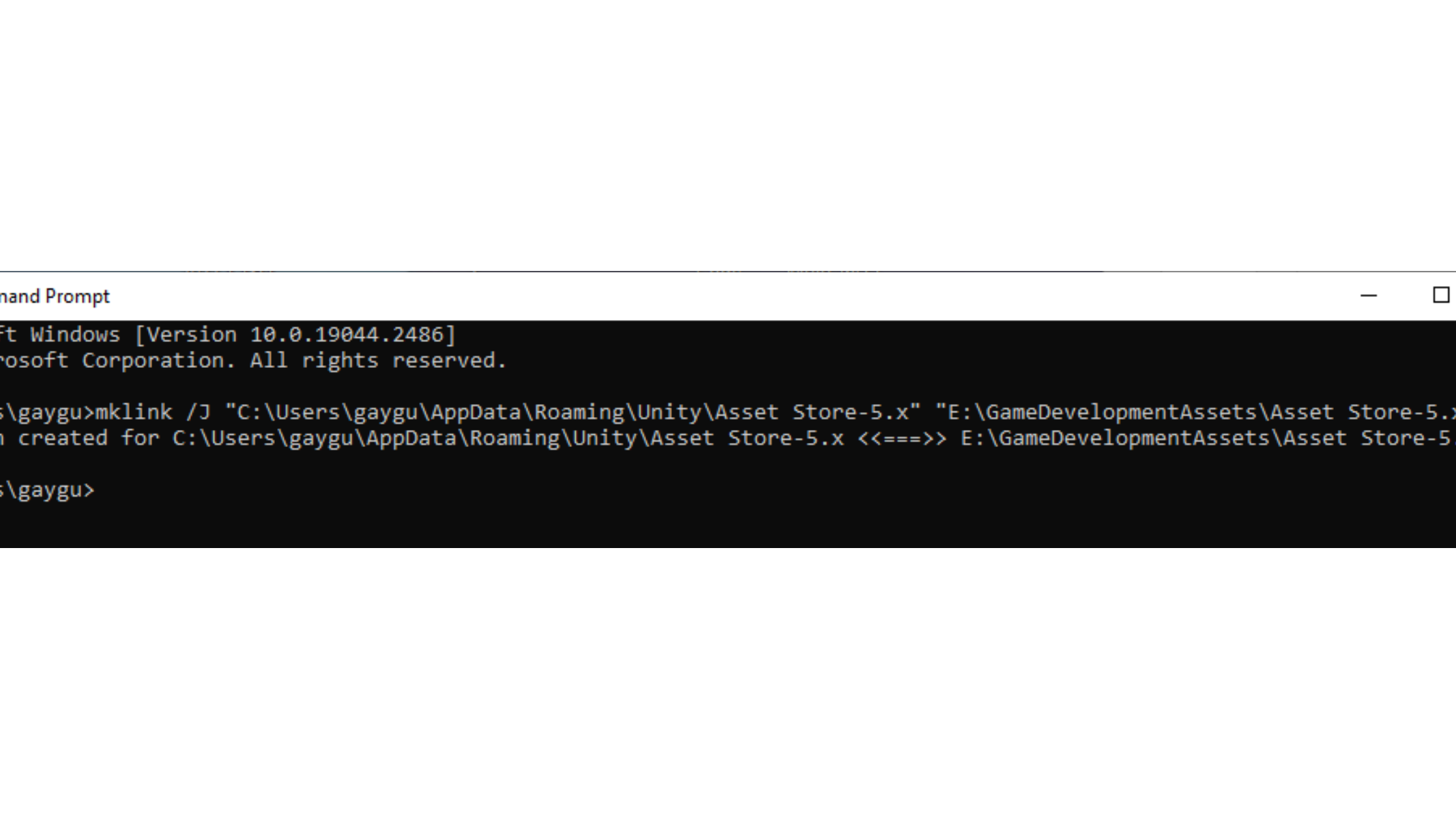 Command Prompt showing mklink junction creation for Unity Asset Store folder